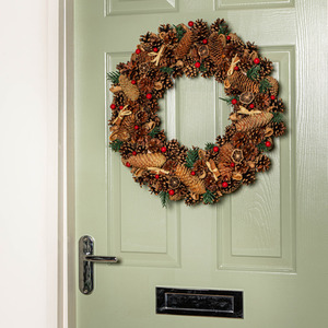 Hanging Christmas Wreath with Pine Cones Red Berries and Dried Fruit