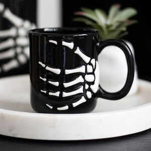 Skeleton Hand Coffee Mug For A Spooky Sip