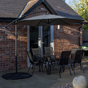 6 Person Glass TopTable Chairs With Grey Banana Parasol and Base