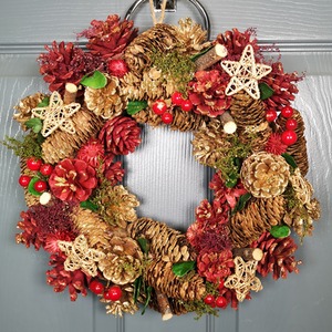 Christmas Wreath with Pine Cones and Berries.