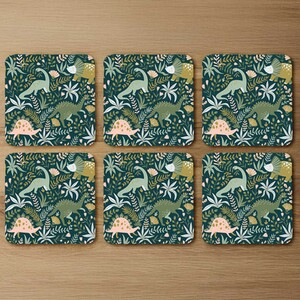 Hand drawn dinosaurs and tropical leaves and flowers. Designer Coaster Set