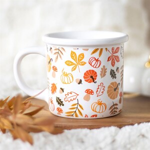 Autumn Leaves And Pumpkins Cozy Mug