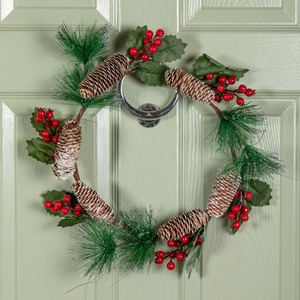 Hanging Christmas Wreath with Red Berries and Pinecones