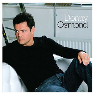 Donny Osmond On Couch Fridge Magnet
