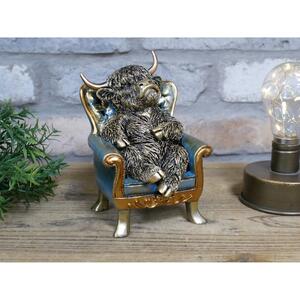Highland Cow On A Chair