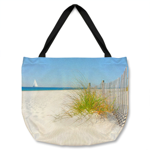 Dune fence by sea grass with sailboat on horizon Designer Tote bag