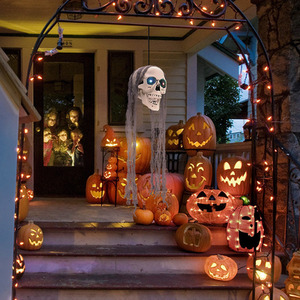 Human Skull Hanging Ghost with Glowing Eyes