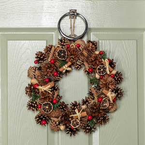 Christmas Wreath with Pine Cones Red Berries and Dried Fruit
